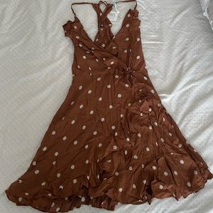 Lace up back frilly polka dot dress